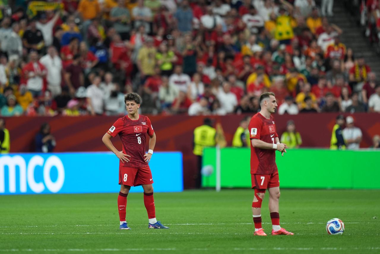 Kerem Akturkoglu (7) and Arda Guler (8) of Türkiye react after conceding a goal during the 2026 FIFA World Cup First Stage Group D match between Australia and Türkiye at BC Place Stadium in Vancouver, Canada, June 13, 2026. (AA Photo)