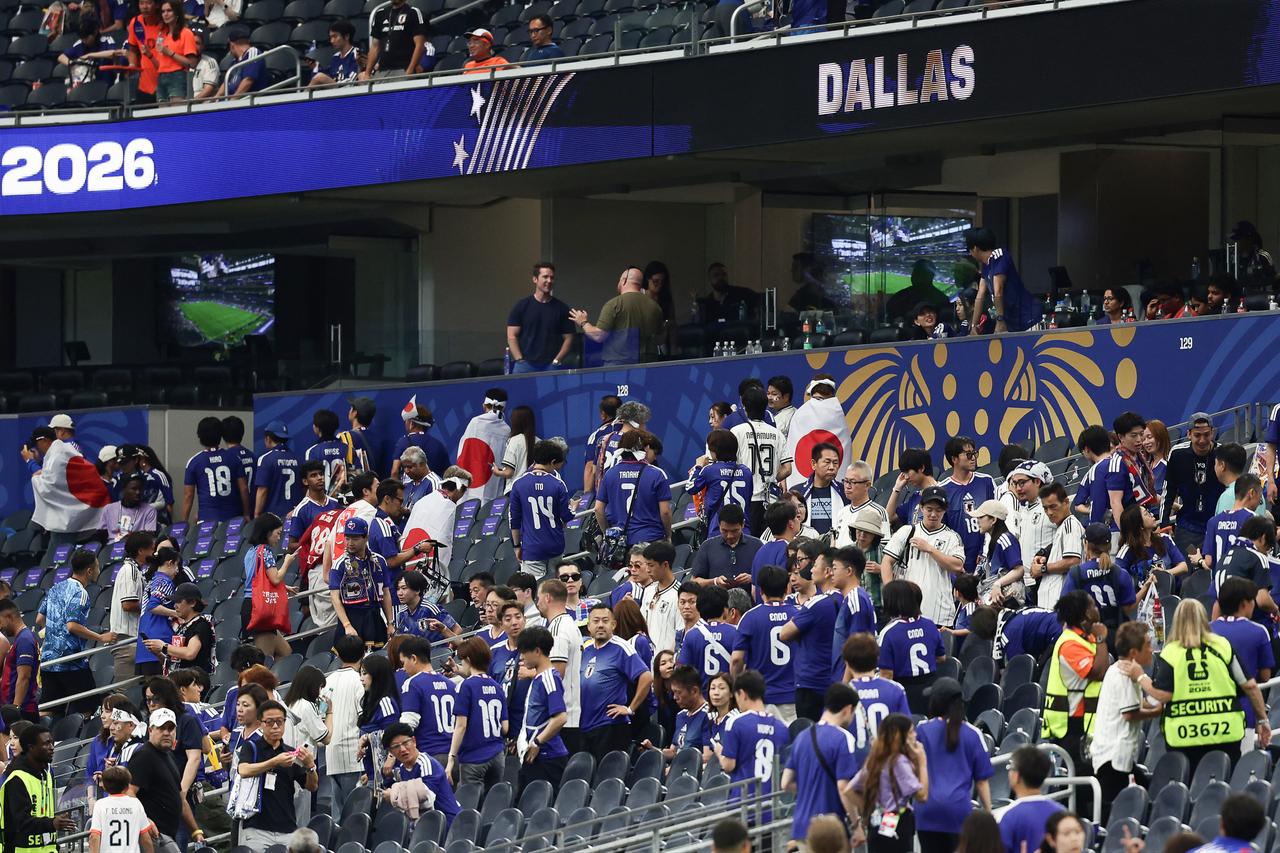 Japan supporters leave the tribunes after the  2026 World Cup Group F football match between the Netherlands and Japan at the Dallas Stadium in Arlington, Texas, on June 14, 2026.  (AFP Photo)