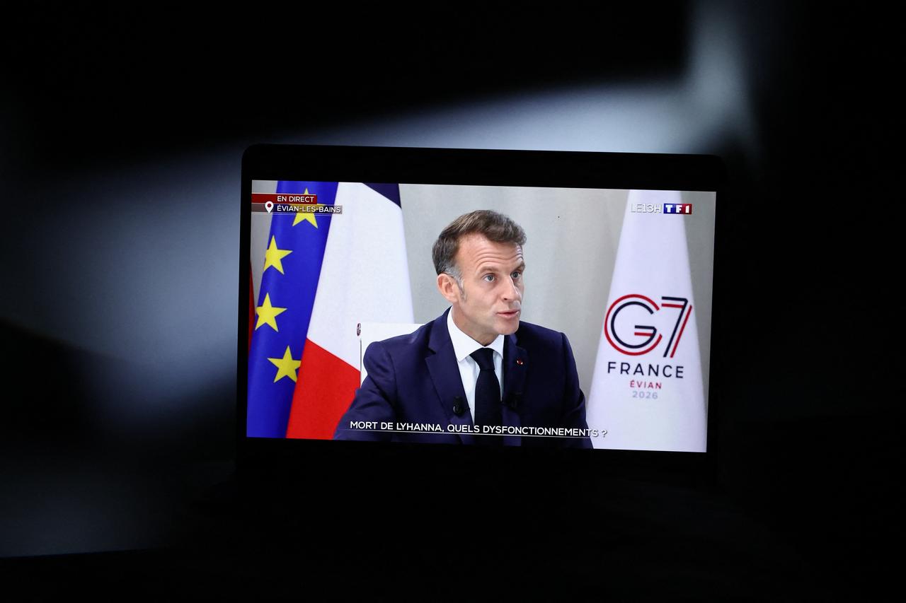 This photograph shows a computer screen at AFP headquarters in Paris displaying France's President Emmanuel Macron speaking during an interview as part of French TV channel TF1's news broadcast on the sidelines of the G7 summit, in Evian, central-eastern France, June 15, 2026. (AFP Photo)