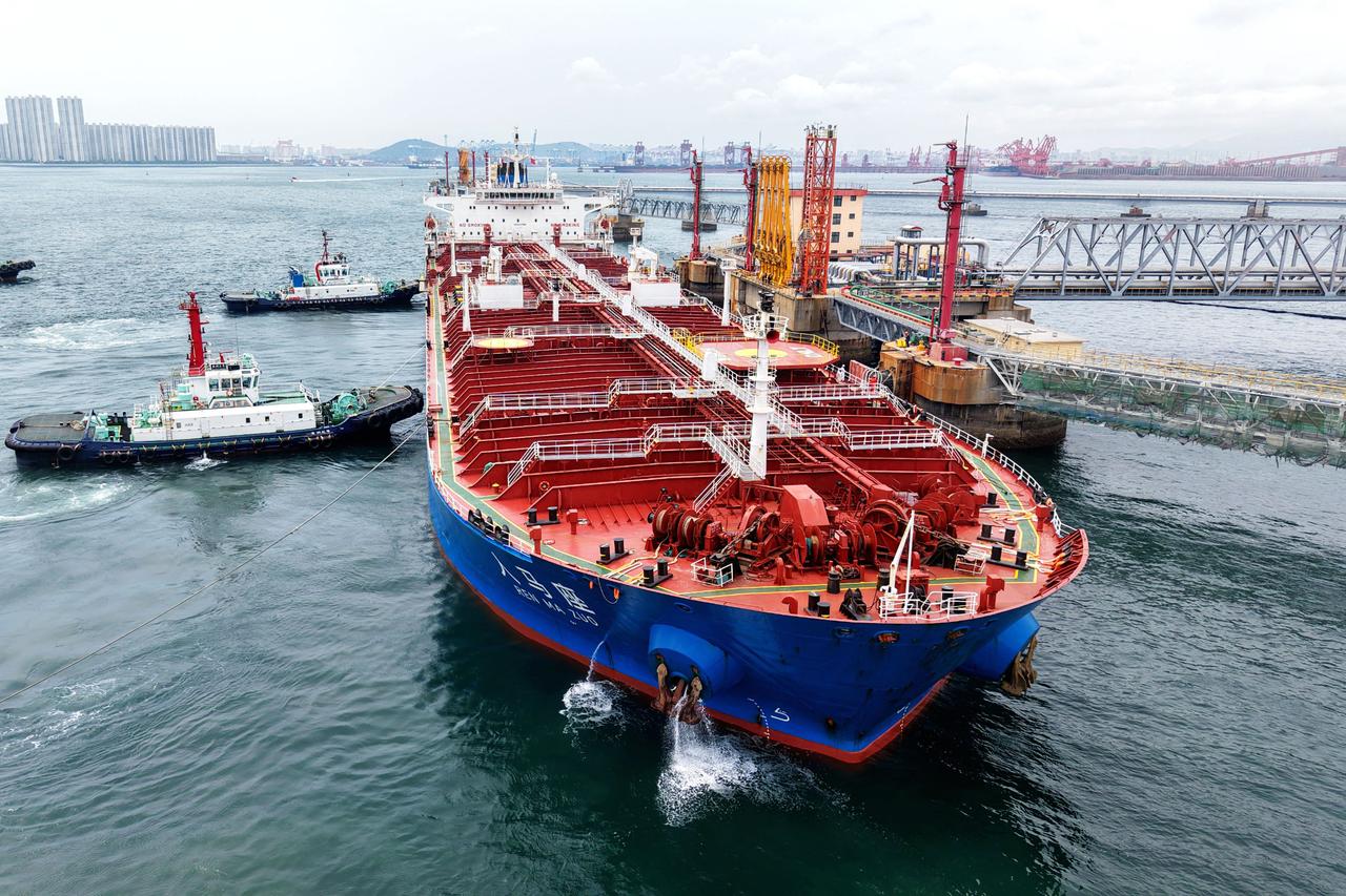 Oil returns to around $80 on Iran deal, gold pares losses, stocks jump