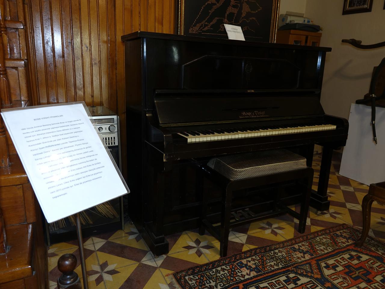 The historic Bogs & Voigt piano, said to have been intended for Spain’s King Alfonso XIII, is seen inside the Ayse Sidika Erke Ethnography Museum in Edremit, western Türkiye. (AA Photo)
