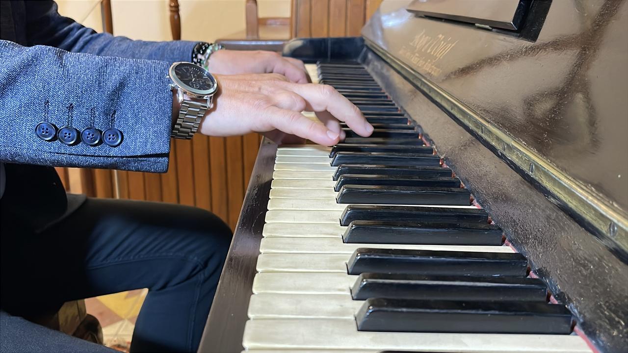 A close-up shows the original keys of the historic piano displayed at the Ayse Sidika Erke Ethnography Museum in Edremit, western Türkiye. (AA Photo)