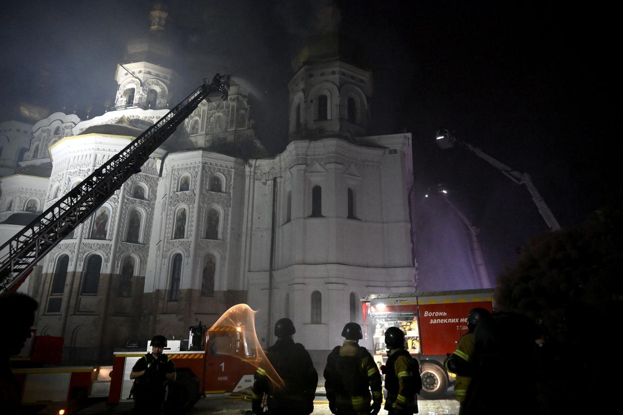 Firefighters put out a blaze in the Dormition Cathedral in the Orthodox complex of the Kyiv Pechersk Lavra following a Russian missile strike on the Ukrainian capital Kyiv on June 15, 2026. (AFP Photo)