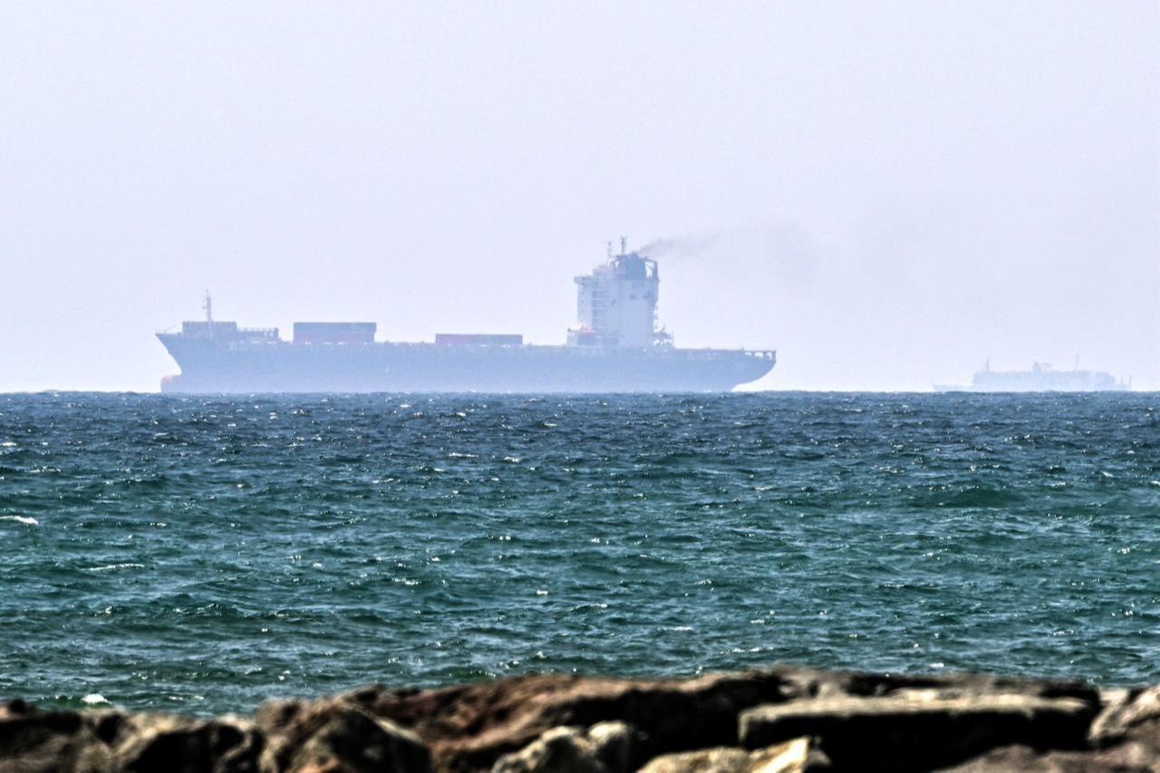 Vessels are seen off the coast of Sharjah in the United Arab Emirates on May 21, 2026. (AFP Photo)