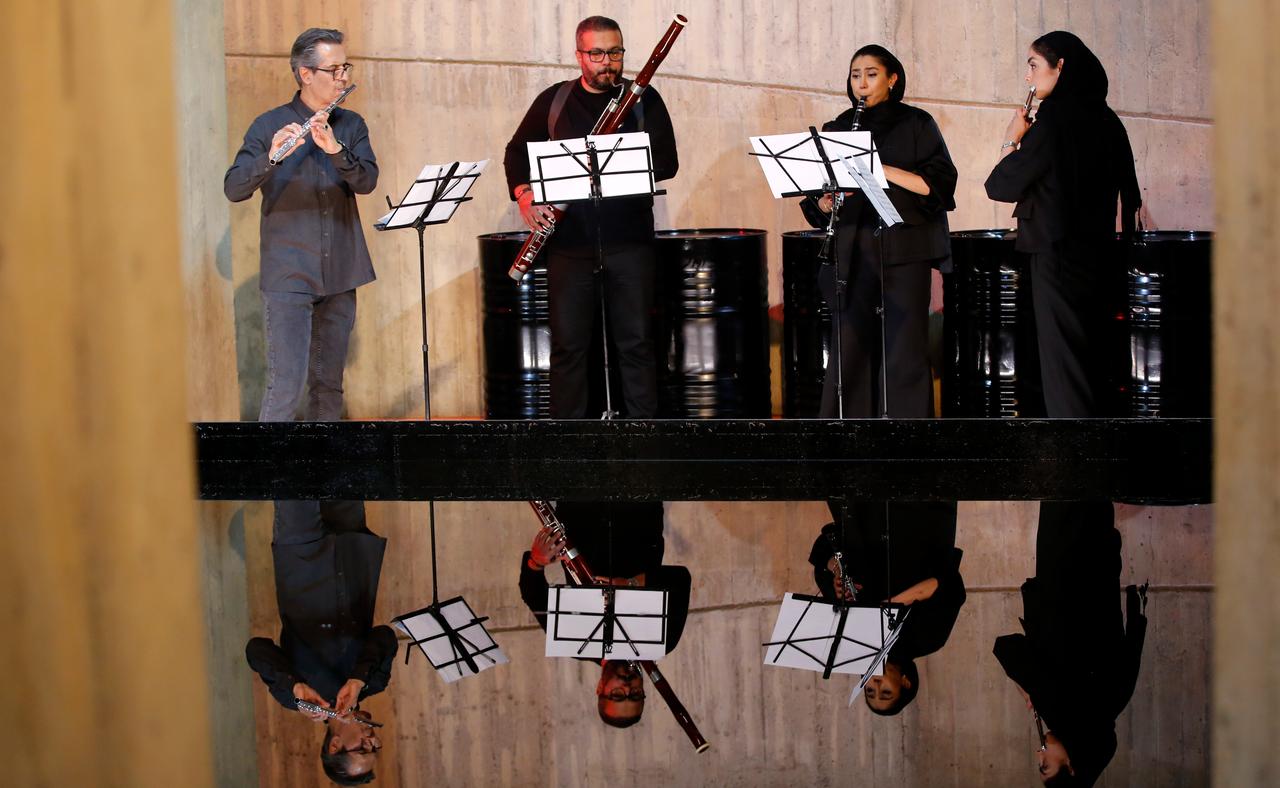 Musicians perform classical wind instruments during the "An Embroidery on Minab" art event at the Tehran Museum of Contemporary Art in Tehran, Iran on June 14, 2026. (AA Photo)