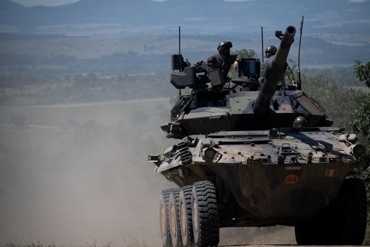 Italian military soldiers drive a tank during the International live-fire tactical exercise "STRIKE BACK 26" at the Koren Training Area, southern Bulgaria, June 11, 2026. (AFP Photo)