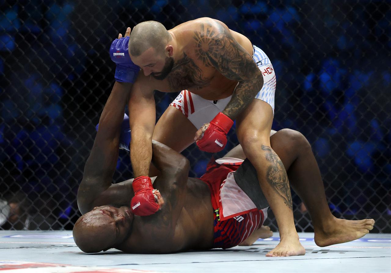 Josh Hokit of the United States lands a punch on Derrick Lewis of the United States during UFC Freedom 250 at the White House on June 14, 2026 in Washington, DC. (AFP Photo)