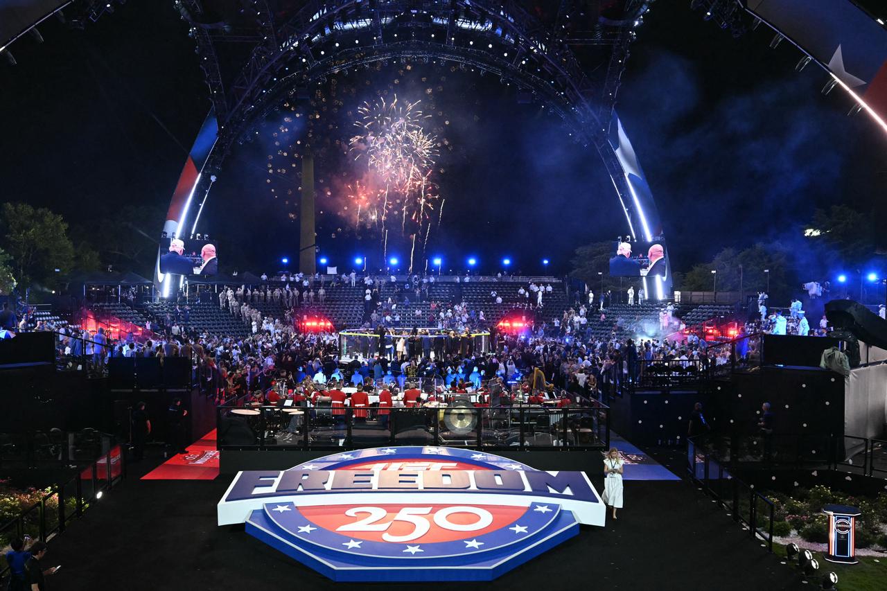 Fireworks go off as America's Justin Gaethje celebrates after defeating Georgia's Ilia Topuria during "UFC Freedom 250" mixed martial arts event on the South Lawn of the White House in Washington, DC, June 15, 2026. (AFP Photo)