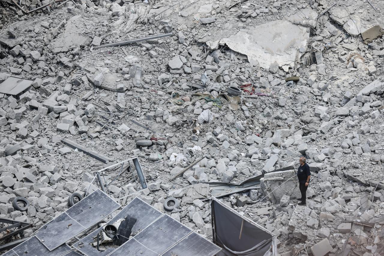 A man stands on the rubble of a destroyed building as displaced residents return to Nabatieh in southern Lebanon, June 15, 2026. (AFP Photo)