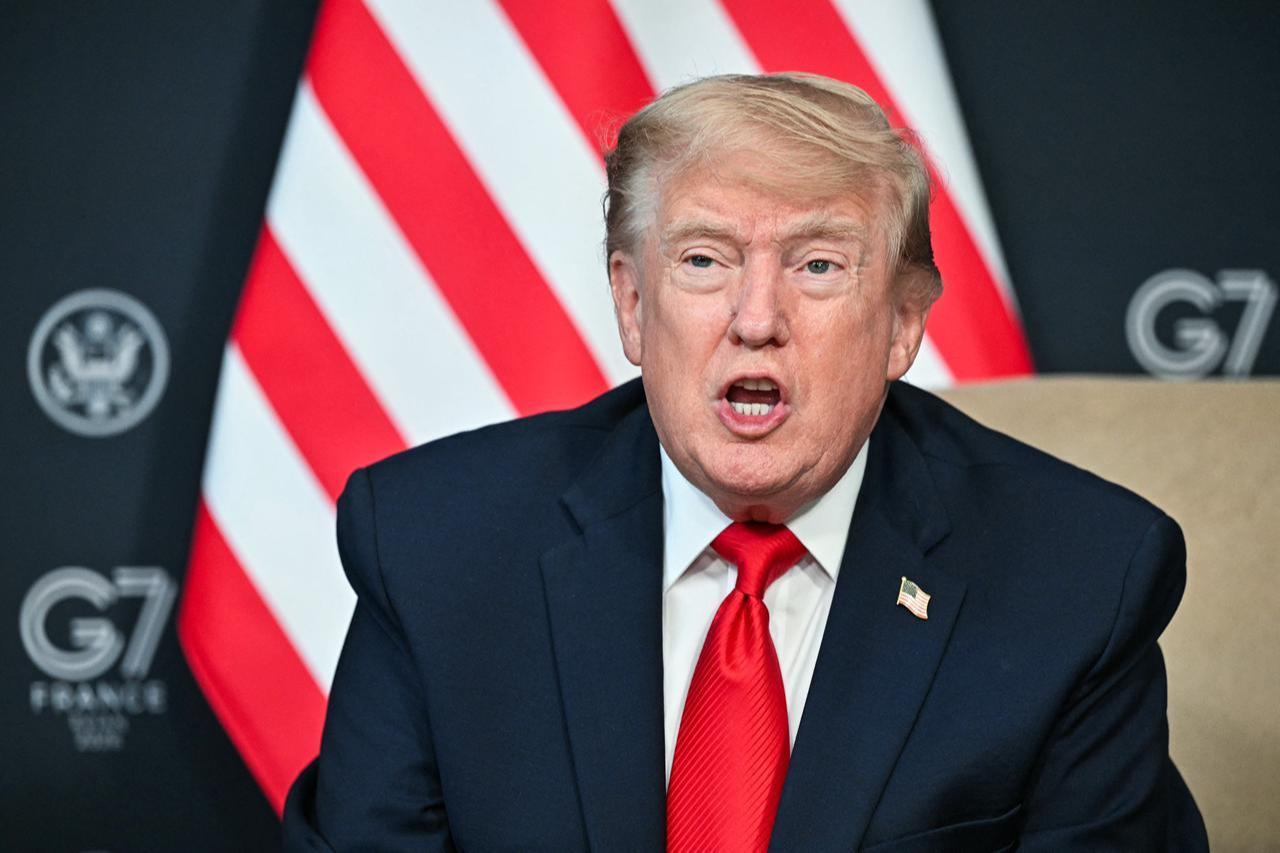 US President Donald Trump attends a bilateral meeting with Qatar's Emir on the sidelines of the G7 summit in Evian, eastern France, June 16, 2026. (AFP Photo)