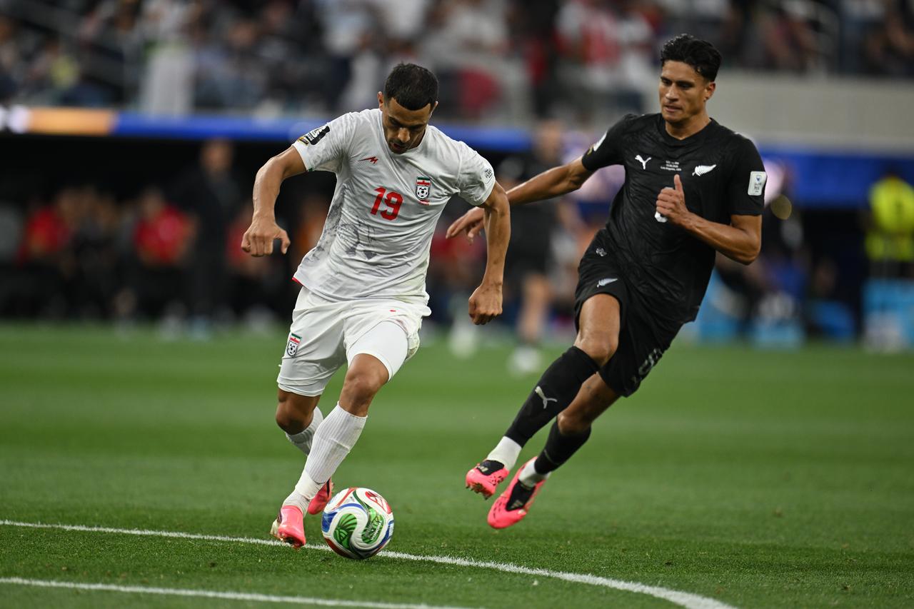 Iran fights back twice to draw 2-2 with New Zealand in World Cup opener