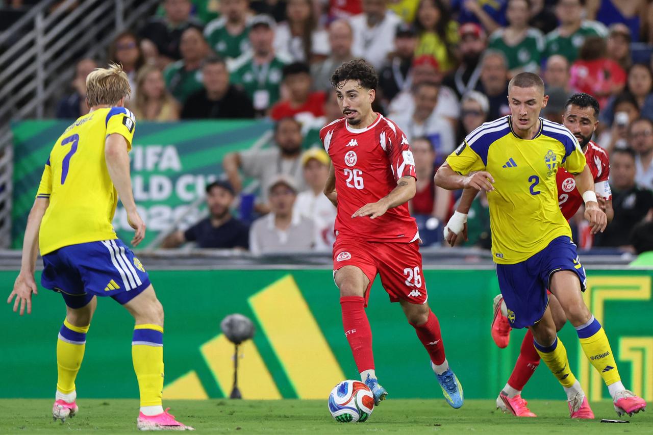 Sweden's midfielder #07 Lucas Bergvall, Tunisia's forward #26 Sebastian Tounekti and Sweden's defender #02 Gustaf Lagerbielke fight for the ball during the 2026 World Cup Group F football match between Sweden and Tunisia at the Monterrey Stadium in Guadalupe, Mexico, on June 14, 2026. (AFP Photo)