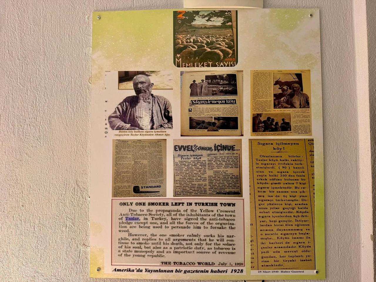 A display shows historical newspaper clippings about Tazlar village's long-running smoke-free tradition in Afyonkarahisar, western Türkiye, June 15, 2026. (IHA Photo)