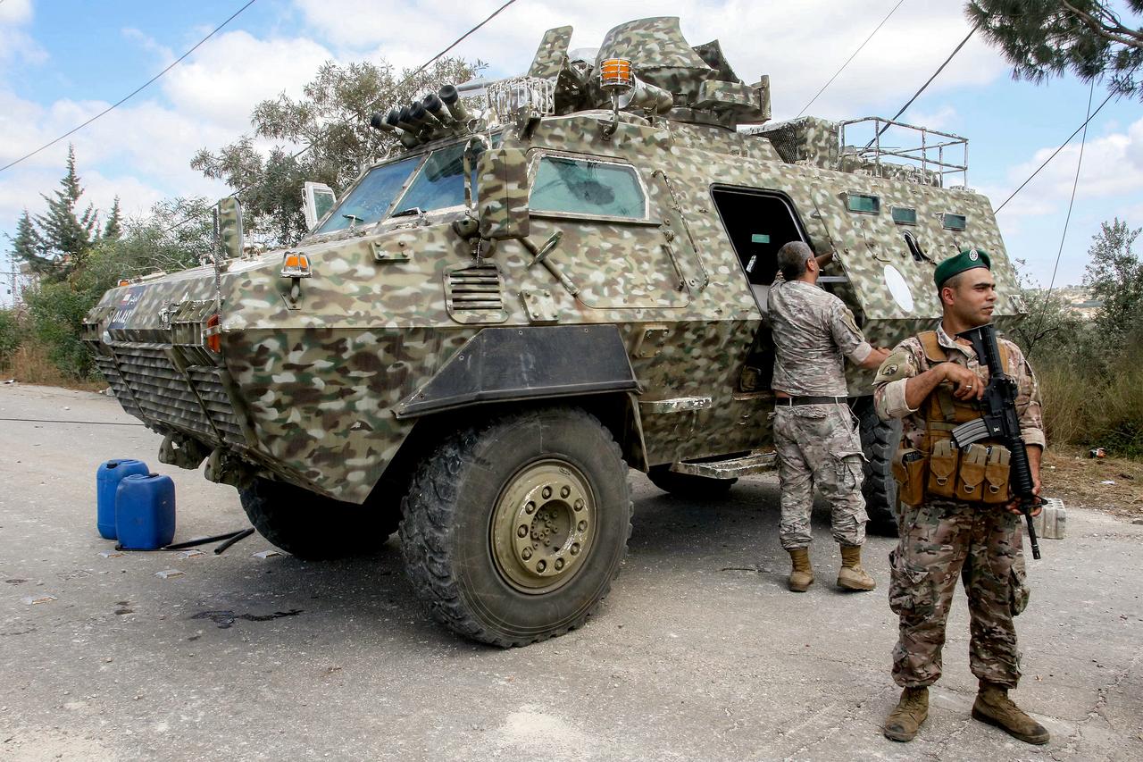 Lebanese army forces set up a checkpoint at the entrance of the village of Ghandourieh in southern Lebanon on June 15, 2026, preventing people from crossing towards villages the Israeli military is believed to have deployed. (AFP Photo)
