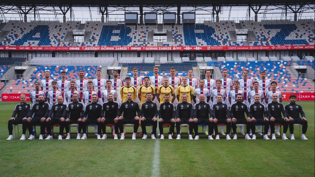 Players and coaching staff of Polish club Gornik Zabrze pose for the team's official 2025-26 season photograph at the club's home stadium in Zabrze, Poland. (Photo via gornikzabrze.pl)