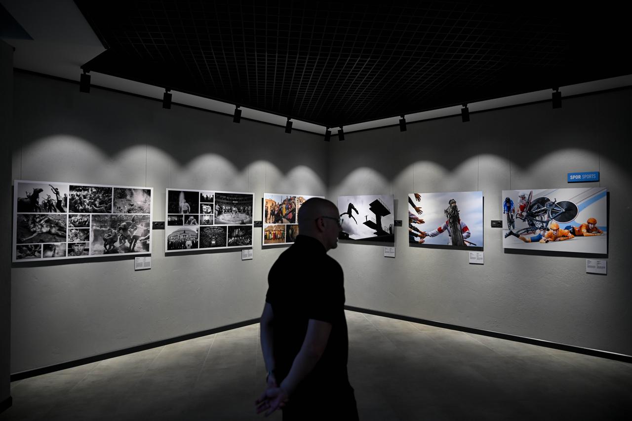 People visit the first exhibition of Istanbul Photo Awards 2026 at Anadolu Agency's AAtolye Exhibition Hall in Ankara, Türkiye, June 15, 2026. (AA Photo)