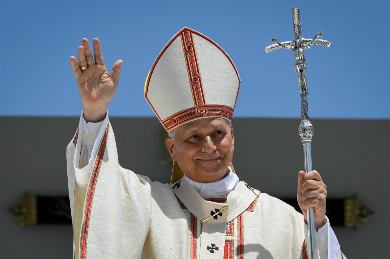 This handout photo released on June 12, 2026 by The Vatican Media shows Pope Leo XIV leading a Holy mass at the port of Santa Cruz de Tenerife, on the Canary Island of Tenerife, June 12, 2026. (Photo via Vatican Media/AFP)