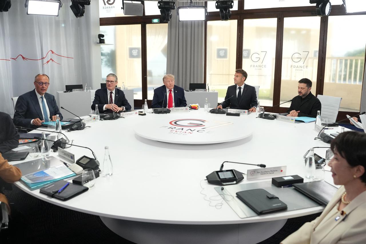 (From L) Germany's Chancellor Friedrich Merz, Britain's Prime Minister Keir Starmer, US President Donald Trump, France's President Emmanuel Macron, Ukraine's President Volodymyr Zelenskyy and Japan's Prime Minister Sanae Takaichia attend a working session at the G7 summit in Evian-les-Bains, central-eastern France, June 16, 2026. (AFP Photo)
