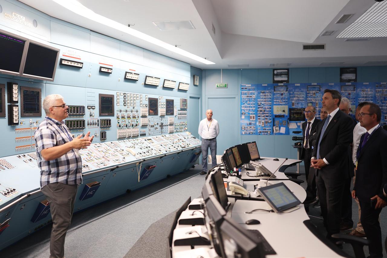 Energy and Natural Resources Minister Alparslan Bayraktar receives a briefing in the control room of Romania's Cernavoda Nuclear Power Plant during a visit to review Canadian-designed CANDU reactor technology in Cernavoda, Romania, June 17, 2026. (AA Photo)