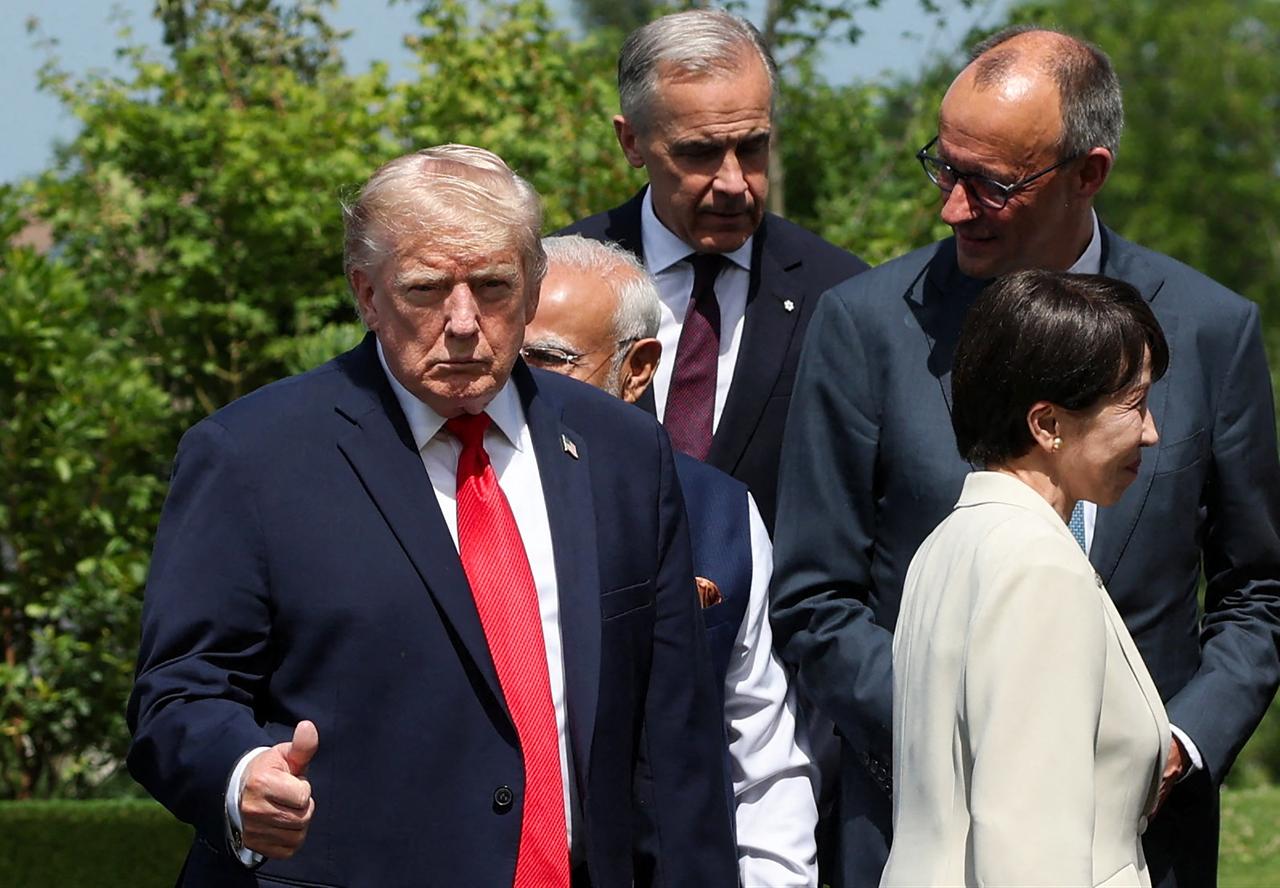 (From L) US President Donald Trump Canada’s Prime Minister Mark Carney, Germany’s Chancellor Friedrich Merz and Japan's Prime Minister Sanae Takaichi arrive for a family photograph during the G7 summit, in Evian, eastern France, June 16, 2026. (AFP Photo)
