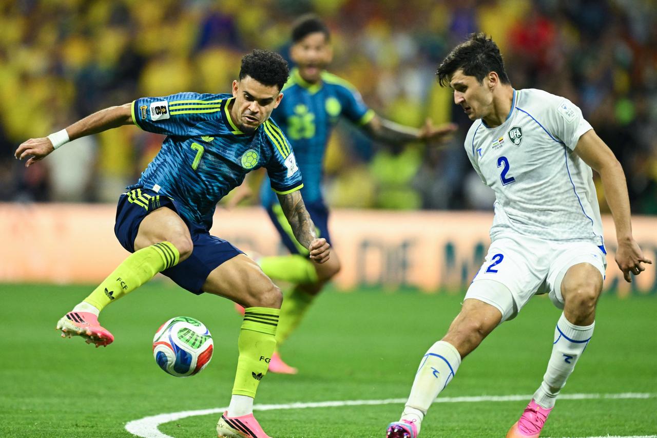 Colombia's forward #07 Luis Diaz controls the ball past Uzbekistan's defender #02 Abdukodir Khusanov during the 2026 World Cup Group K football match between Uzbekistan and Colombia at the Mexico City Stadium in Mexico City on June 17, 2026. (AFP Photo)