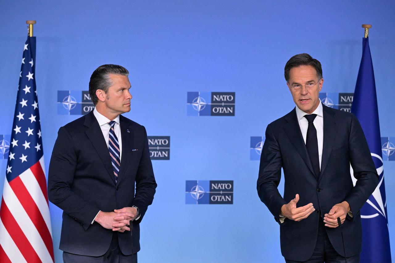 NATO Secretary General Mark Rutte (R) and US Secretary of Defence Pete Hegseth deliver remarks before a NATO Defence Ministers meeting at the NATO headquarters, in Brussels, on June 18, 2026. (AFP Photo)