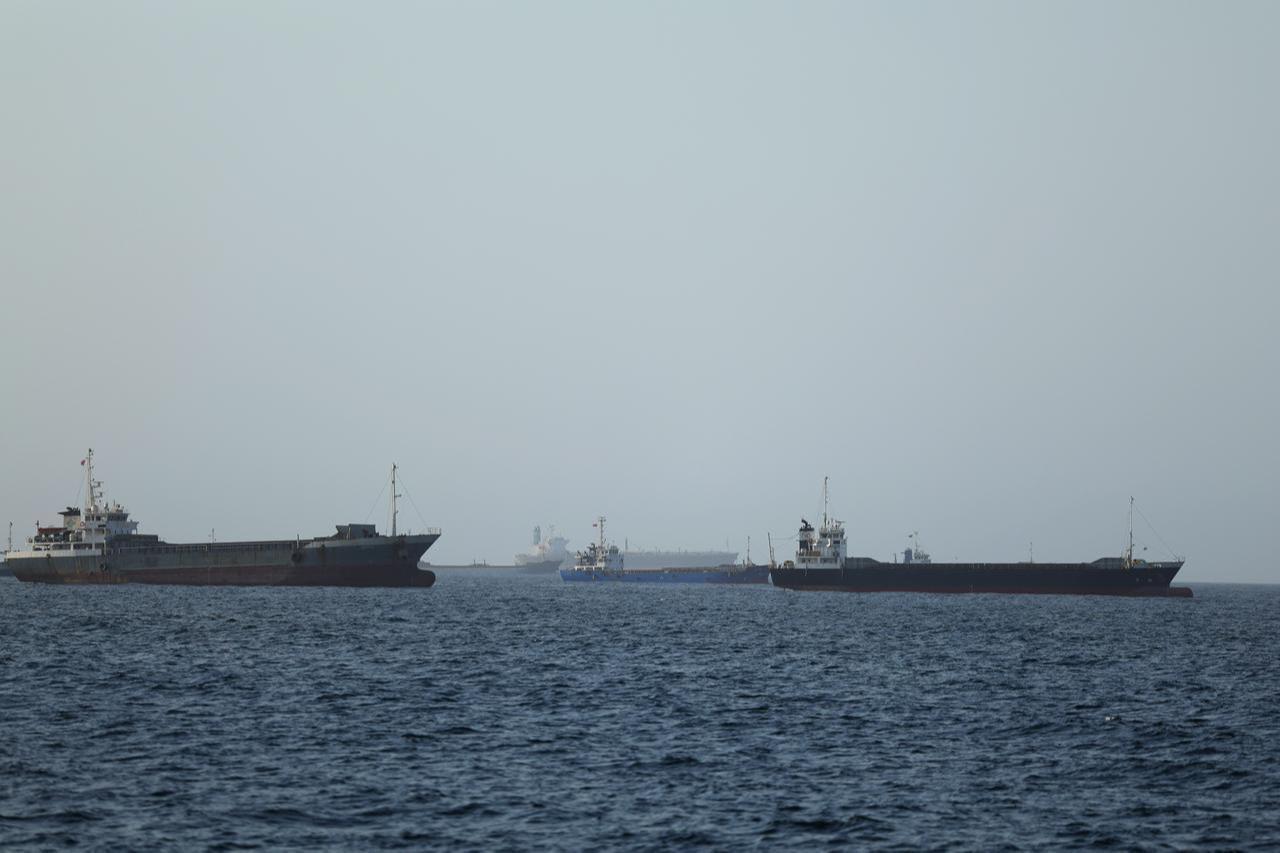 Commercial vessels and oil tankers preparing to transit through the Strait of Hormuz maintain their wait in the Gulf of Oman, June 17, 2026. (AA Photo)