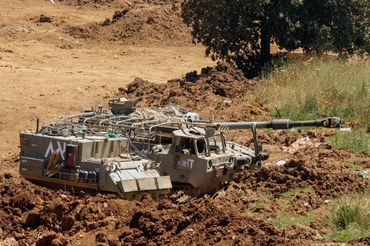This picture, taken from a position in the Upper Galilee in northern Israel, near the Israel-Lebanon border, shows Israeli army vehicles positioned along the border, June 17, 2026. (AFP Photo)