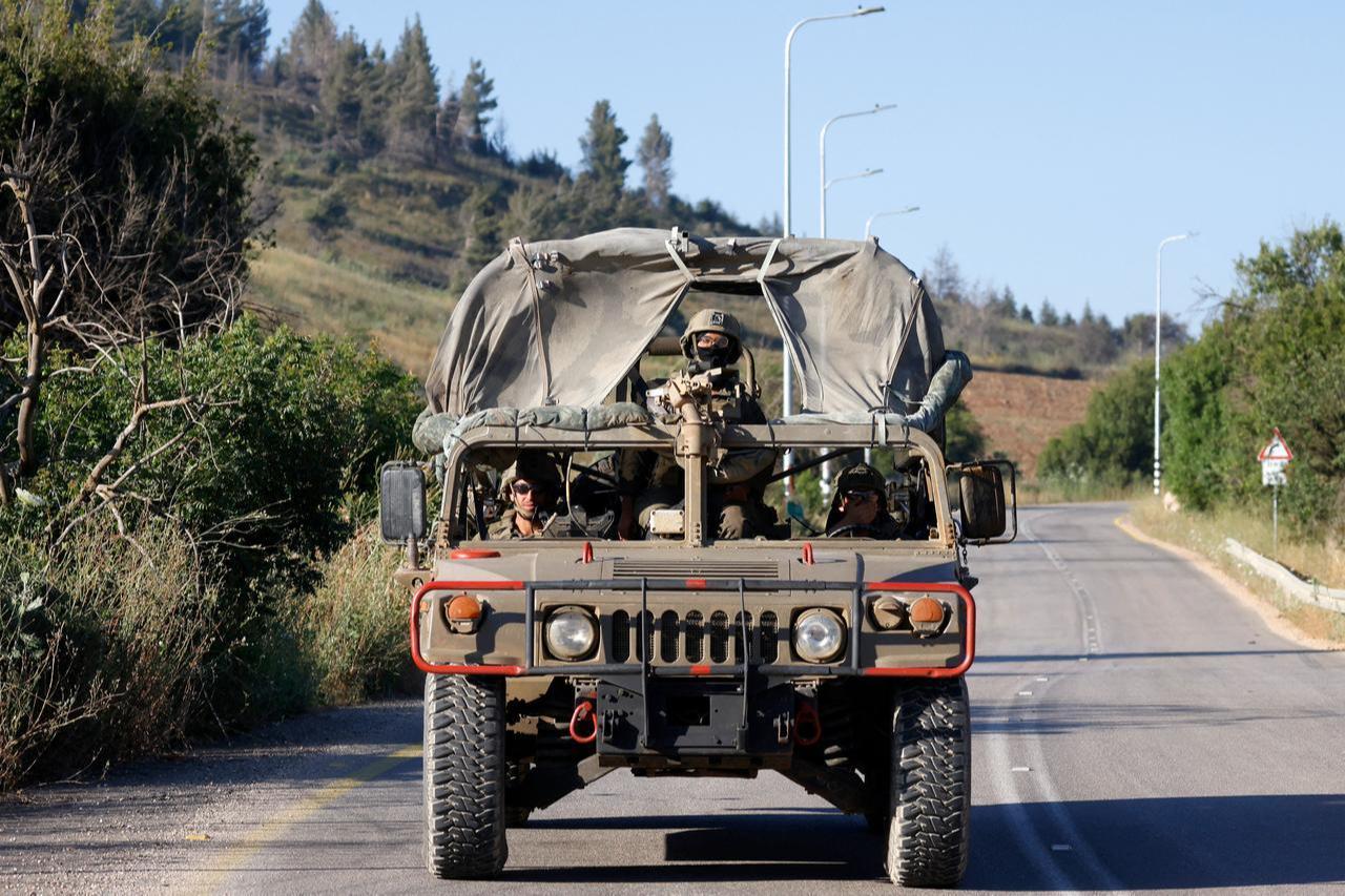 An Israeli army Humvee vehicle patrols along the northern road near Moshav Margaliot in the Upper Galilee bordering Lebanon, June 9, 2026. (AFP Photo)