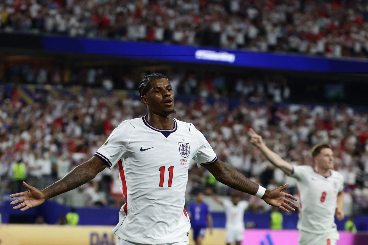 England's forward #11 Marcus Rashford celebrates after scoring a goal during the 2026 World Cup Group L football match between England and Croatia at the Dallas Stadium in Arlington, Texas, on June 17, 2026.  (AFP Photo)