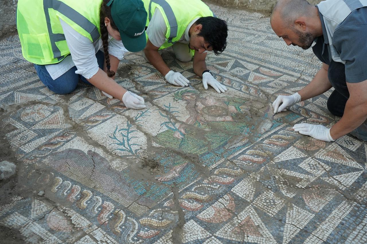 Archaeologists uncover a mosaic-decorated architectural structure measuring approximately 6 by 25 meters during excavations carried out in the eastern square of Theatre Street, which connects the Acropolis of Aspendos with the theater in Antalya, Türkiye, June 18, 2026. (Photo via Ministry of Culture and Tourism)
