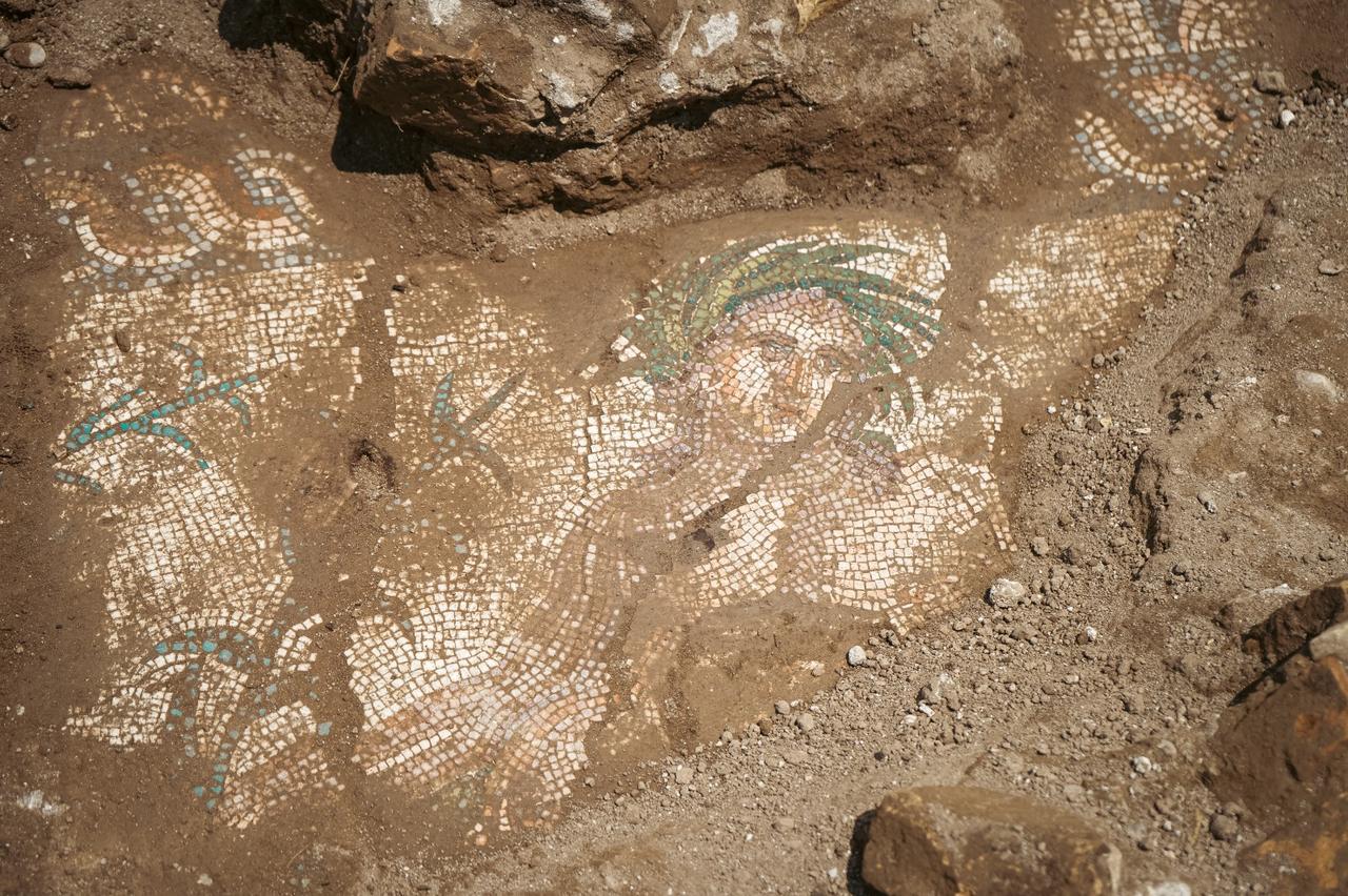 Archaeologists uncover a mosaic-decorated architectural structure measuring approximately 6 by 25 meters during excavations carried out in the eastern square of Theatre Street, which connects the Acropolis of Aspendos with the theater in Antalya, Türkiye, June 18, 2026. (Photo via Ministry of Culture and Tourism)