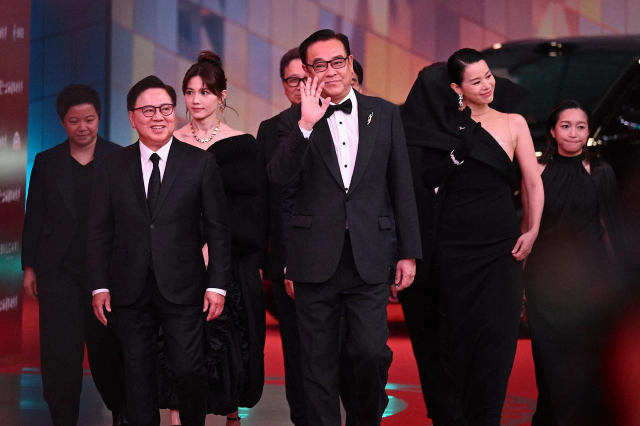 Hong Kong film director Derek Yee (3R) and the cast of “The Fourth Act” arrive on the red carpet of the 28th Shanghai International Film Festival (SIFF) in Shanghai, China, on June 13, 2026. (AFP Photo)