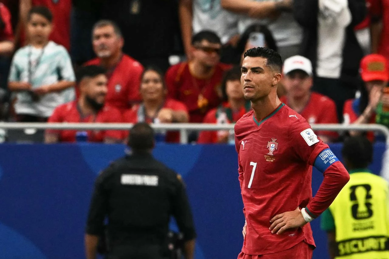 Portugal's forward #07 Cristiano Ronaldo reacts after a draw in the  2026 World Cup Group K football match between Portugal and the Democratic Republic of Congo at the Houston Stadium in Houston, Texas, on June 17, 2026. (AFP Photo)