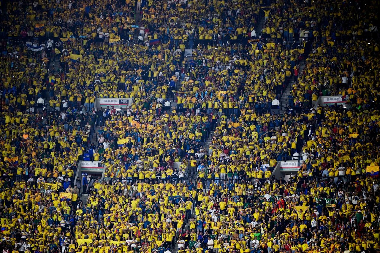 Colombian fans sing the national anthem ahead of the 2026 World Cup Group K football match between Uzbekistan and Colombia at the Mexico City Stadium in Mexico City on June 17, 2026.  (AFP Photo)