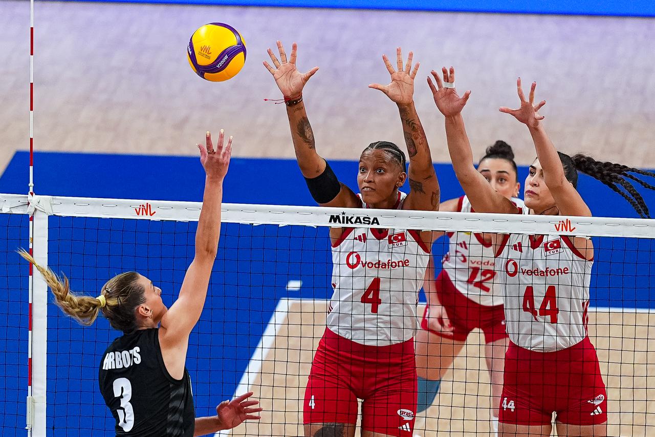 Belgium’s Britt Herbots attacks as Türkiye players block during the 2026 FIVB Women’s Volleyball Nations League match at Ankara Sports Hall in Ankara, Türkiye, June 17, 2026. (AA Photo)