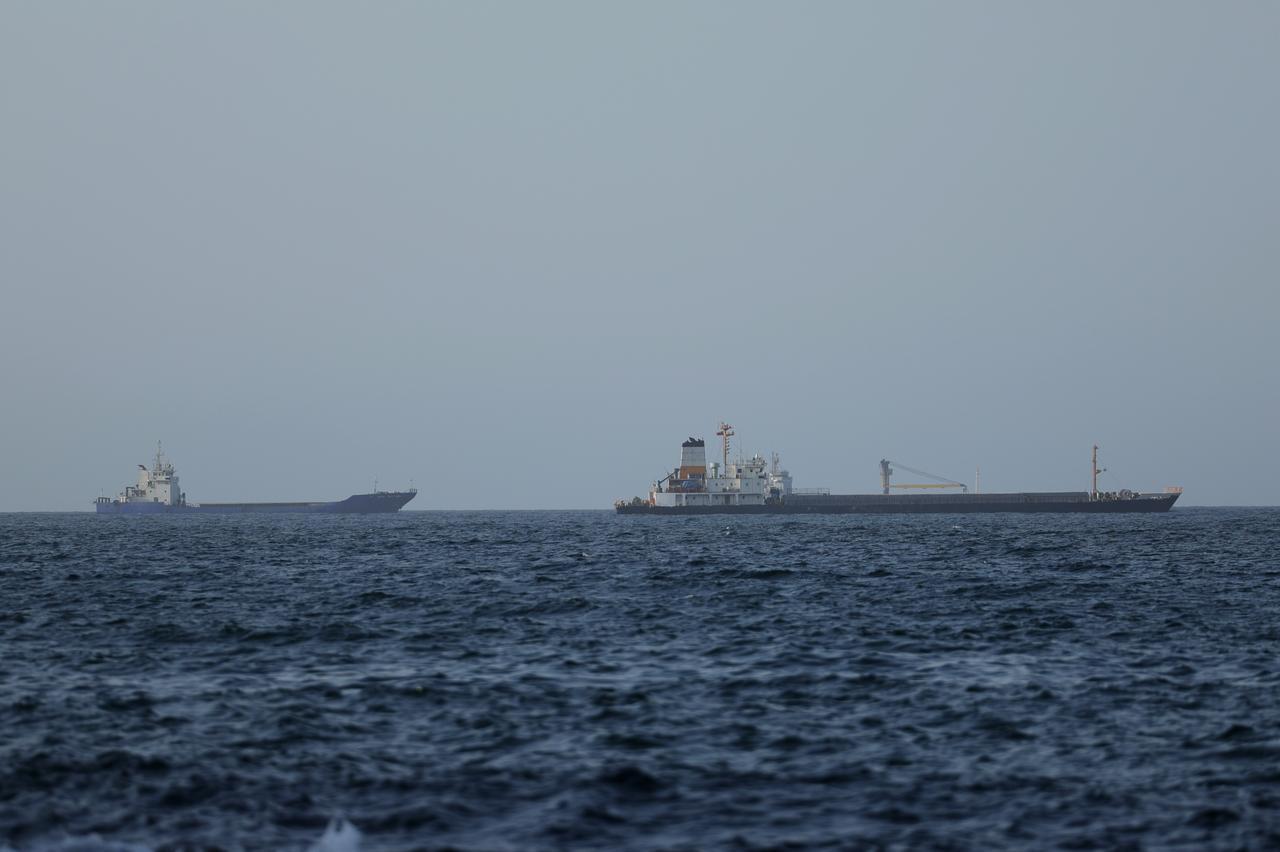 Commercial vessels and oil tankers preparing to transit through the Strait of Hormuz maintain their wait in the Gulf of Oman, June 17, 2026. (AA Photo)