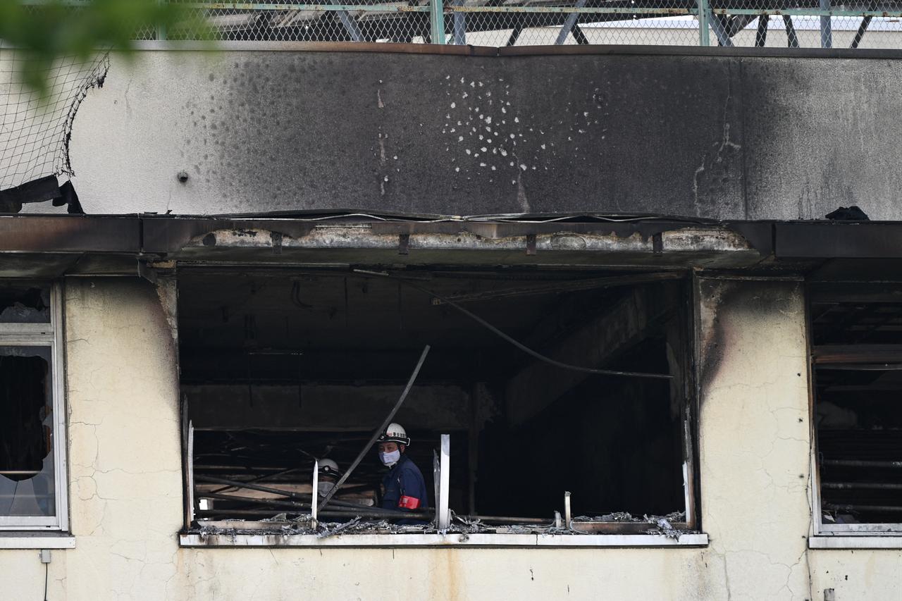 Firefighters work at the scene of a fire at the elementary school in Tokyo on June 19, 2026. (AFP Photo)