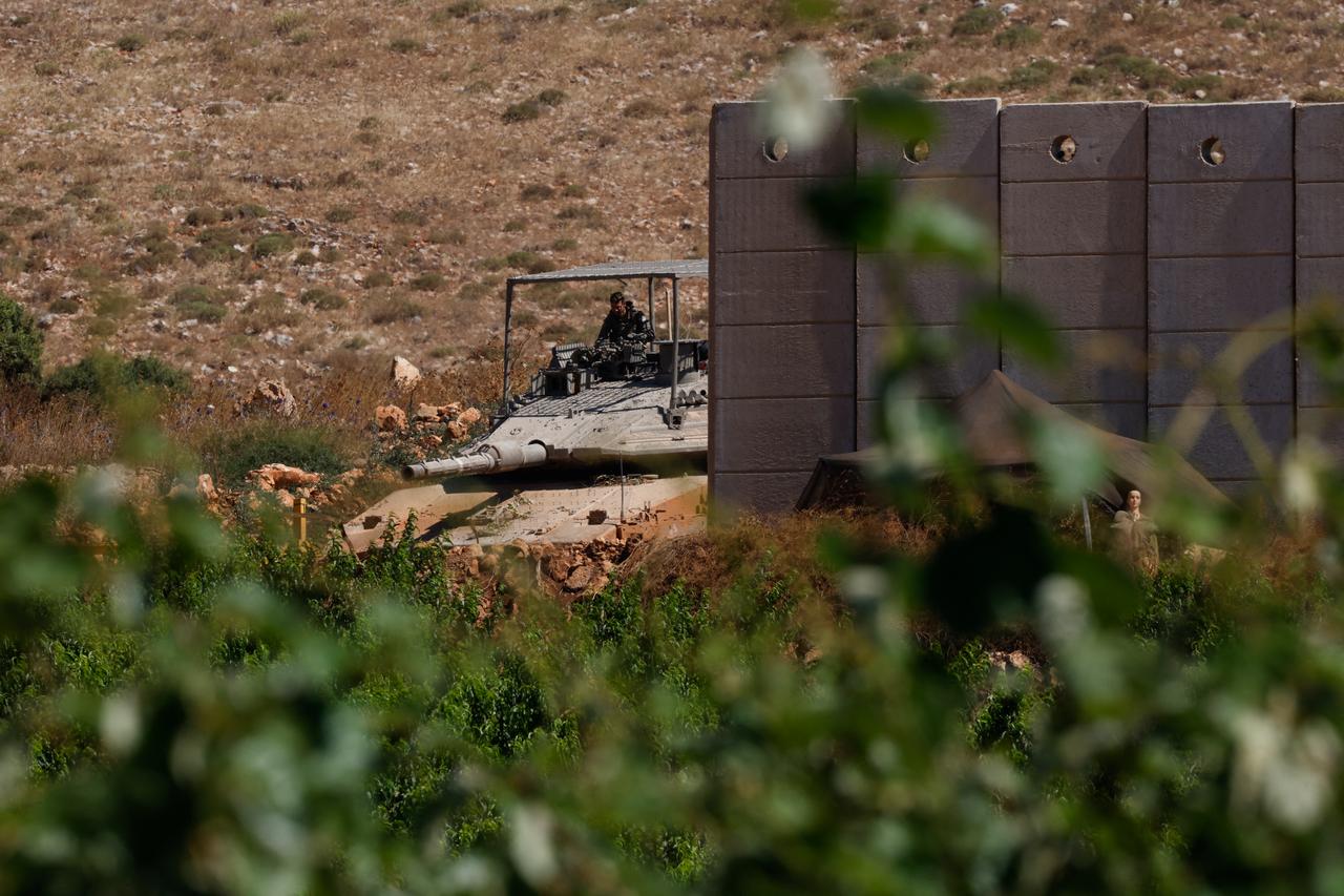 An Israeli army Merkava tank takes position along the northern border with Lebanon in the Upper Galilee on June 18, 2026. (AFP Photo)