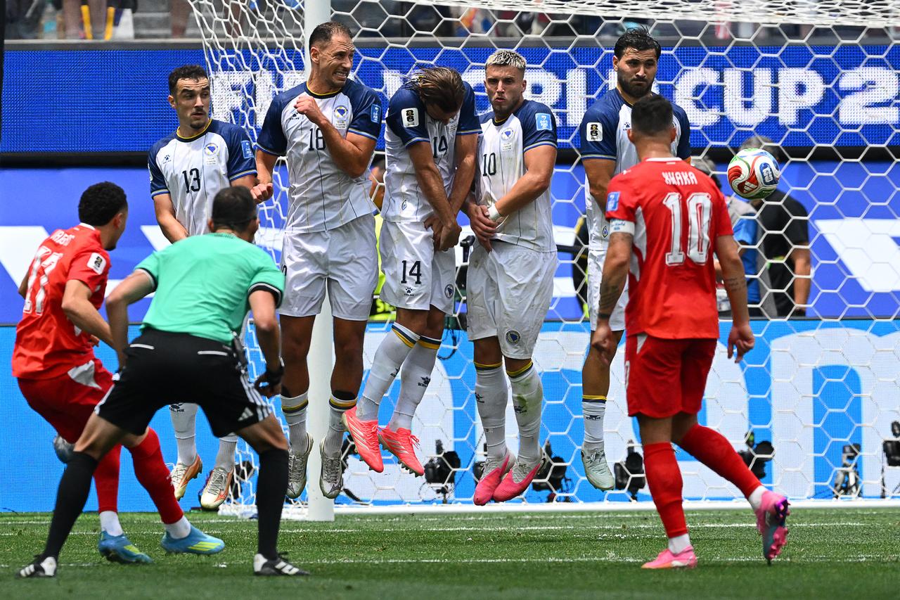 Switzerland erupt late to rout 10-man Bosnia-Herzegovina 4-1