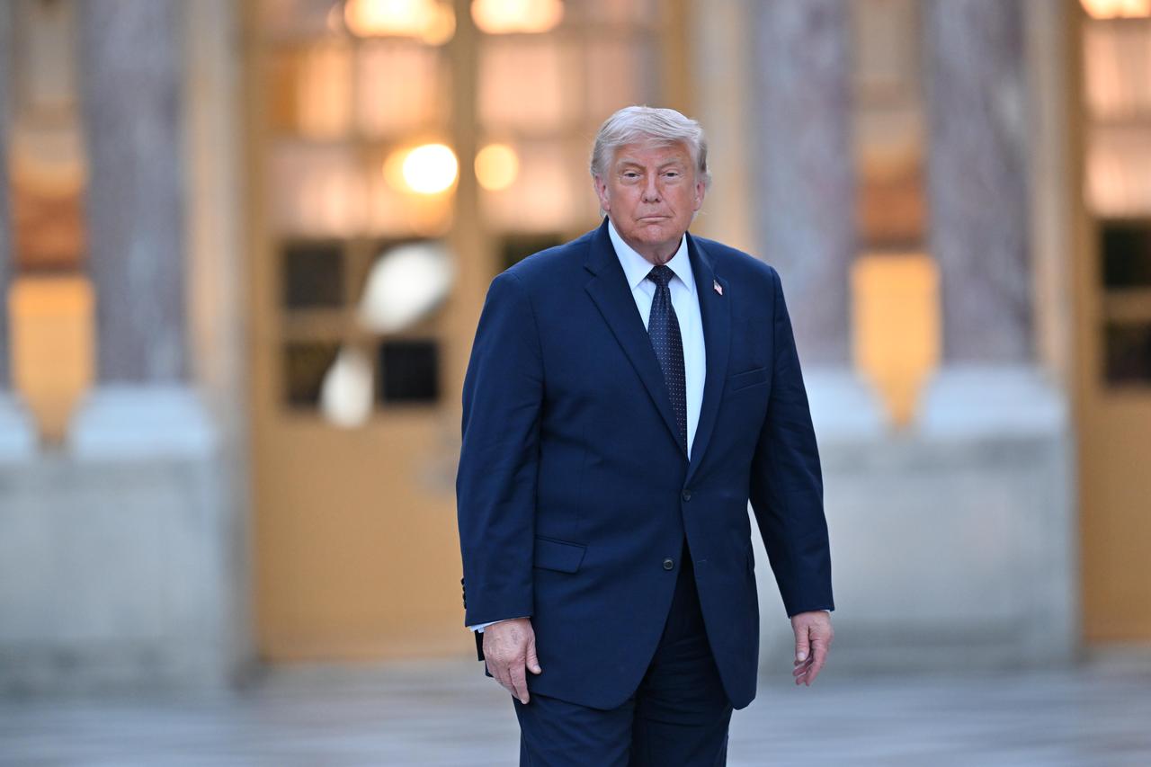 US President Donald Trump and French President Emmanuel Macron attend a dinner at the Palace of Versailles, in Versailles, France, June 17, 2026. (AA Photo)