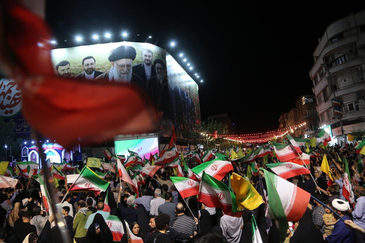 Thousands of people gather at Revolution Square to protest against the attacks launched by the US and Israel on Iran, in Tehran, Iran, May 30, 2026. (AA Photo)