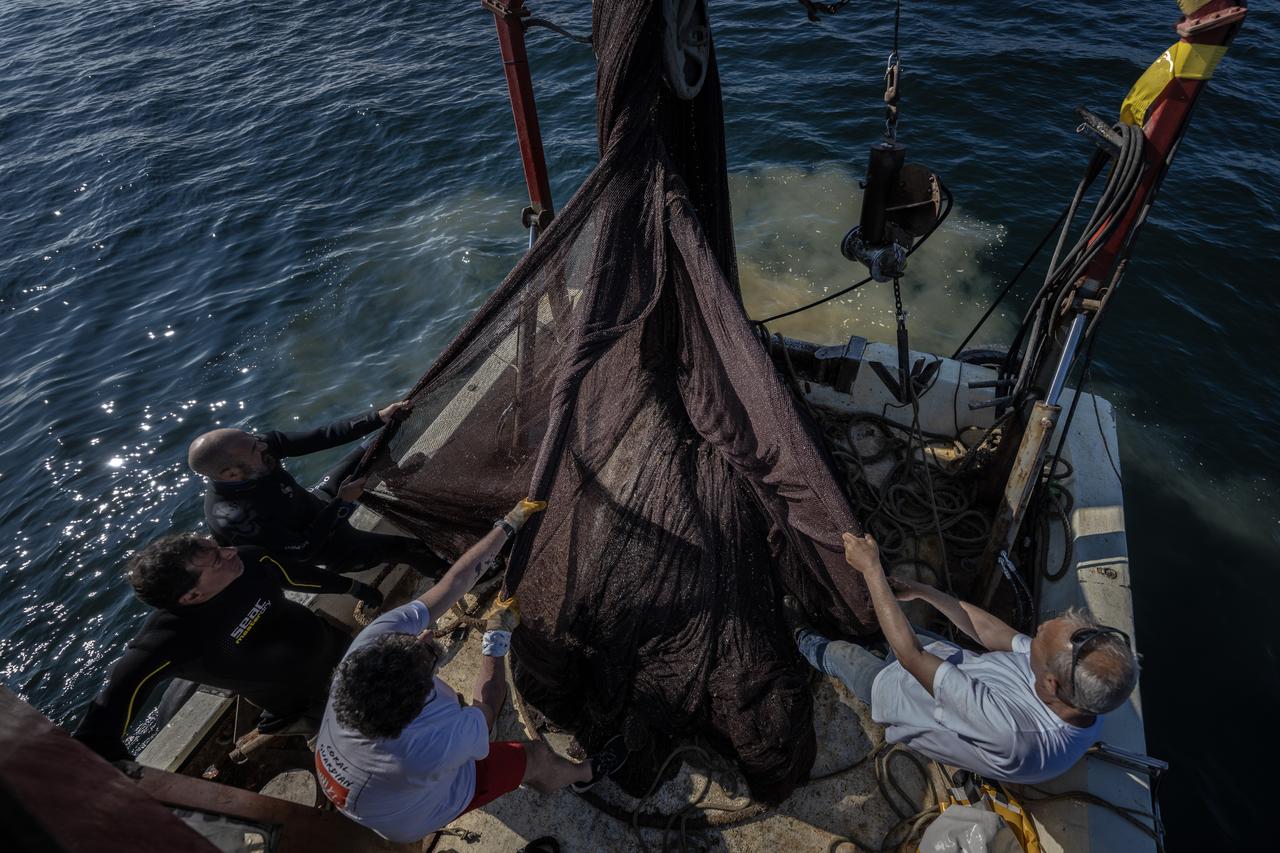 Ghost nets large enough to cover the entire Camlica Tower from top to bottom are recovered during a large-scale ghost net removal operation in Balikesir, Türkiye, May 22, 2026.