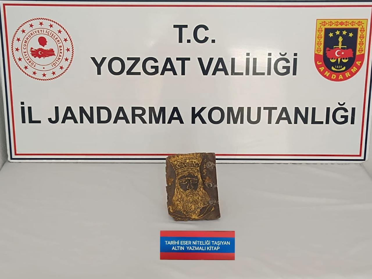 A gold-inscribed historical book seized during an anti-smuggling operation in Sorgun, Yozgat, Türkiye, May 2, 2026. (IHA Photo)