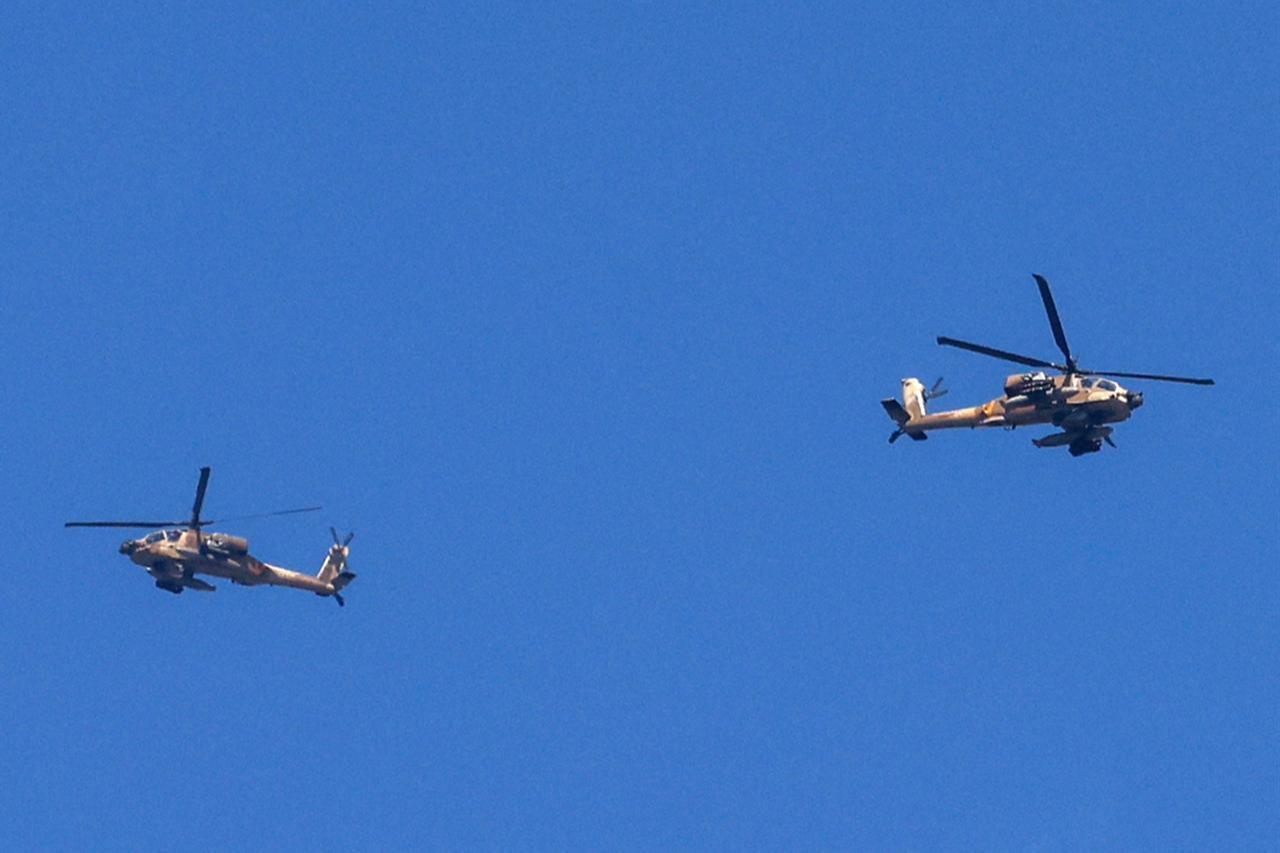 This picture, taken from a position in northern Israel, on the border with southern Lebanon, shows Israeli helicopters flying on May 31, 2026. (AFP Photo)