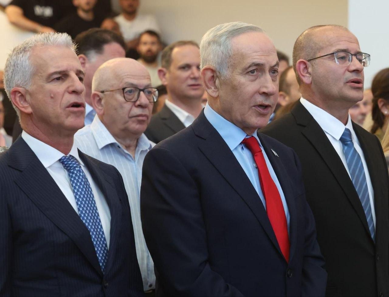 The photo shows the Mossad director Roman Gofman (R), Israeli Prime Minister Benjamin Netanyahu (C), and former Mossad director David Barnea (L) during a handover ceremony in Israel, June 2, 2026. (Photo via Telegram)