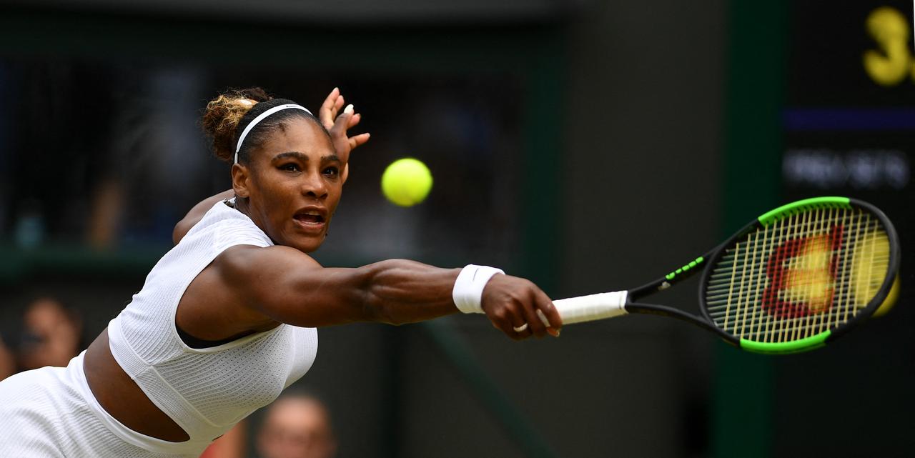 Serena Williams returns against US player Alison Riske during their women's singles quarter-final match in London, England on July 9, 2019. (AFP Photo)