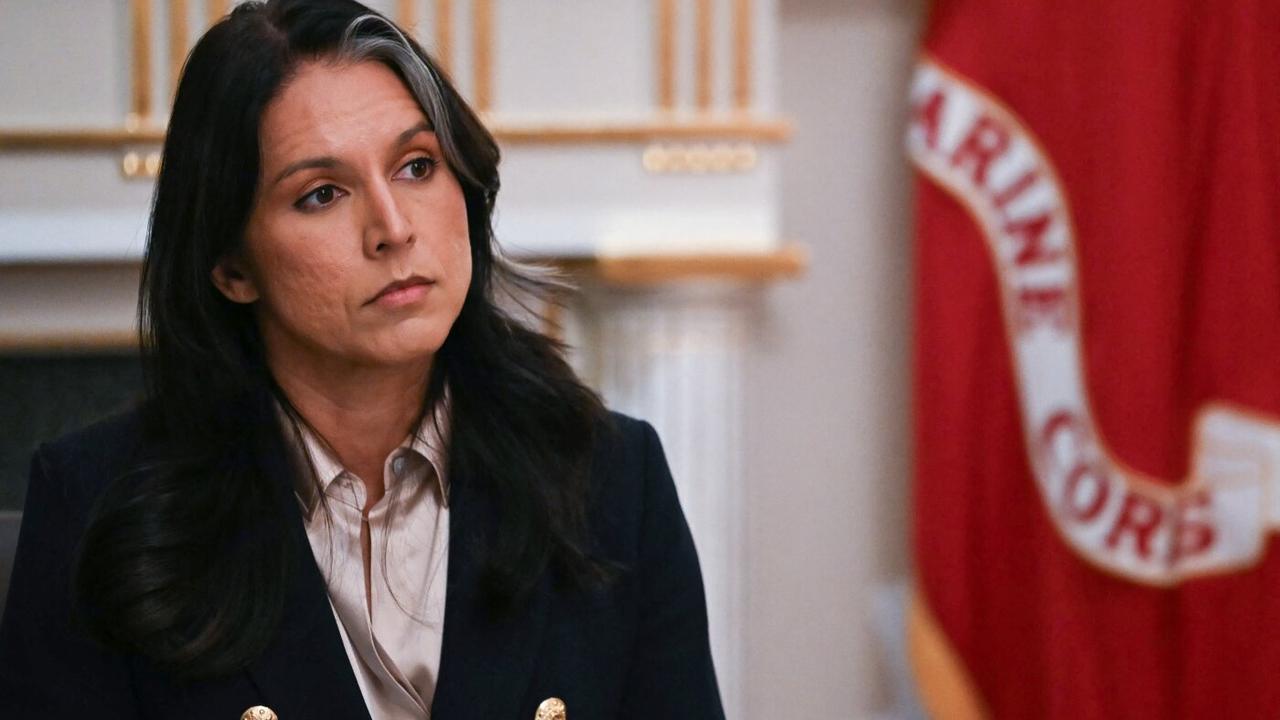 Then-US Director of National Intelligence Tulsi Gabbard listens as President Donald Trump speaks during a Cabinet Meeting in the Cabinet Room of the White House in Washington, DC, December 2, 2025. (AFP Photo)