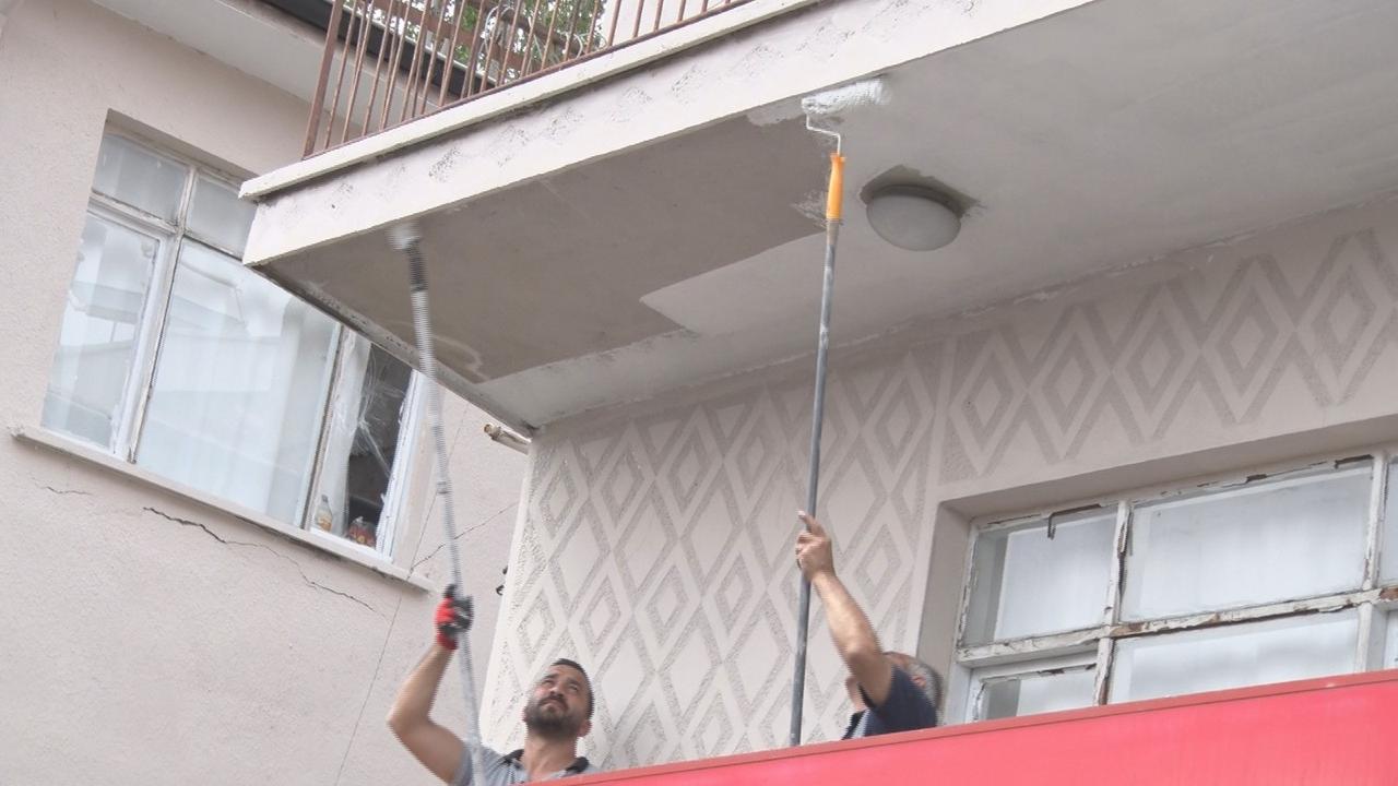 The photo shows workers renovating the facades of some buildings as Ankara prepares for the NATO Summit to be held on July 7-8, Ankara, Türkiye, June 19, 2026. (IHA Photo)