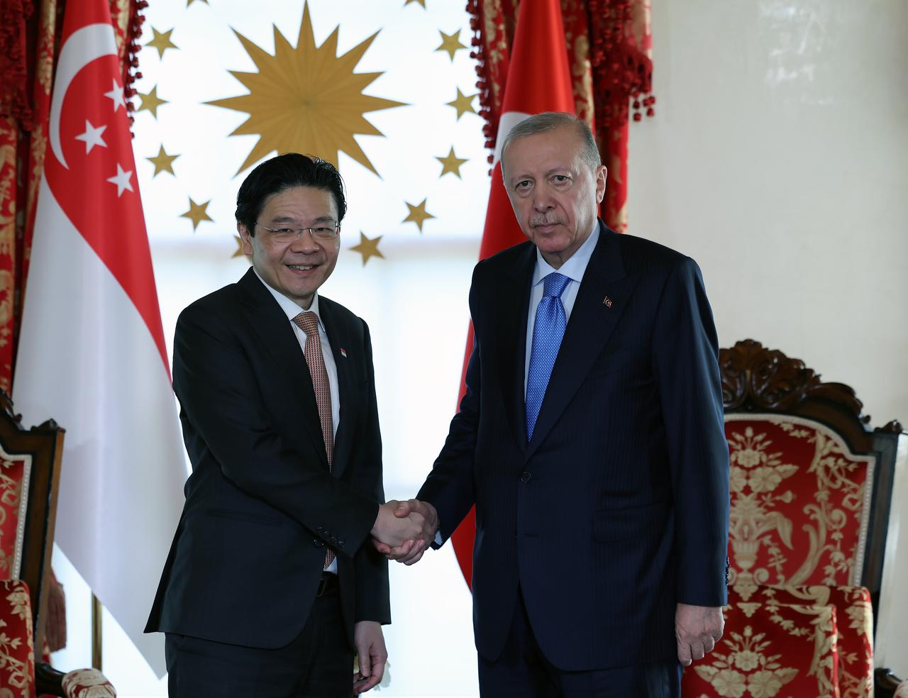 Turkish President Recep Tayyip Erdogan receives Singapore Prime Minister Lawrence Wong at the Presidential Dolmabahce Office in Istanbul, Türkiye, June 19, 2026. (Photo via Turkish Presidency/HO/AA)